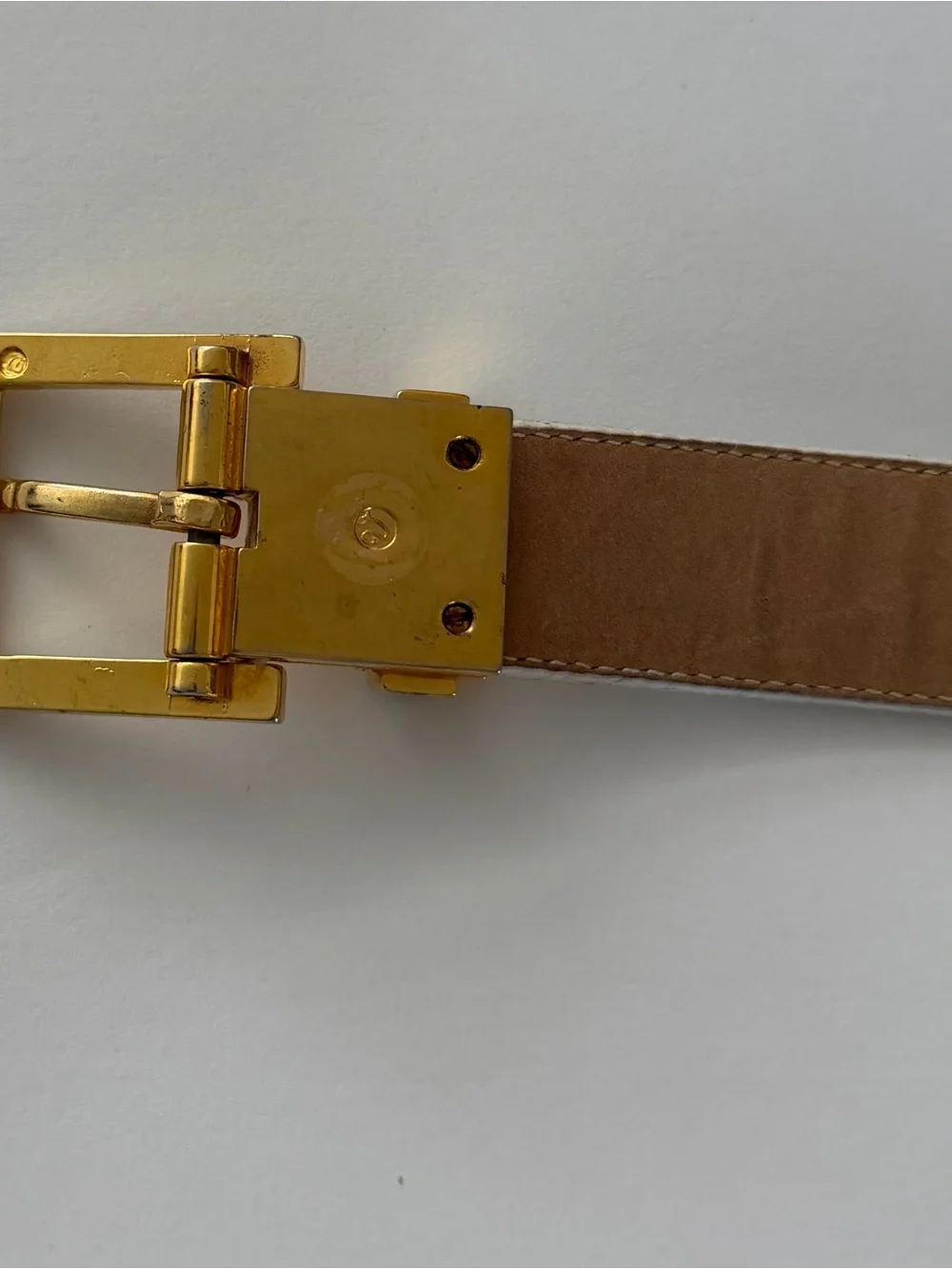 pierre cardin white belt textured, leather-and gold-tone buckle.